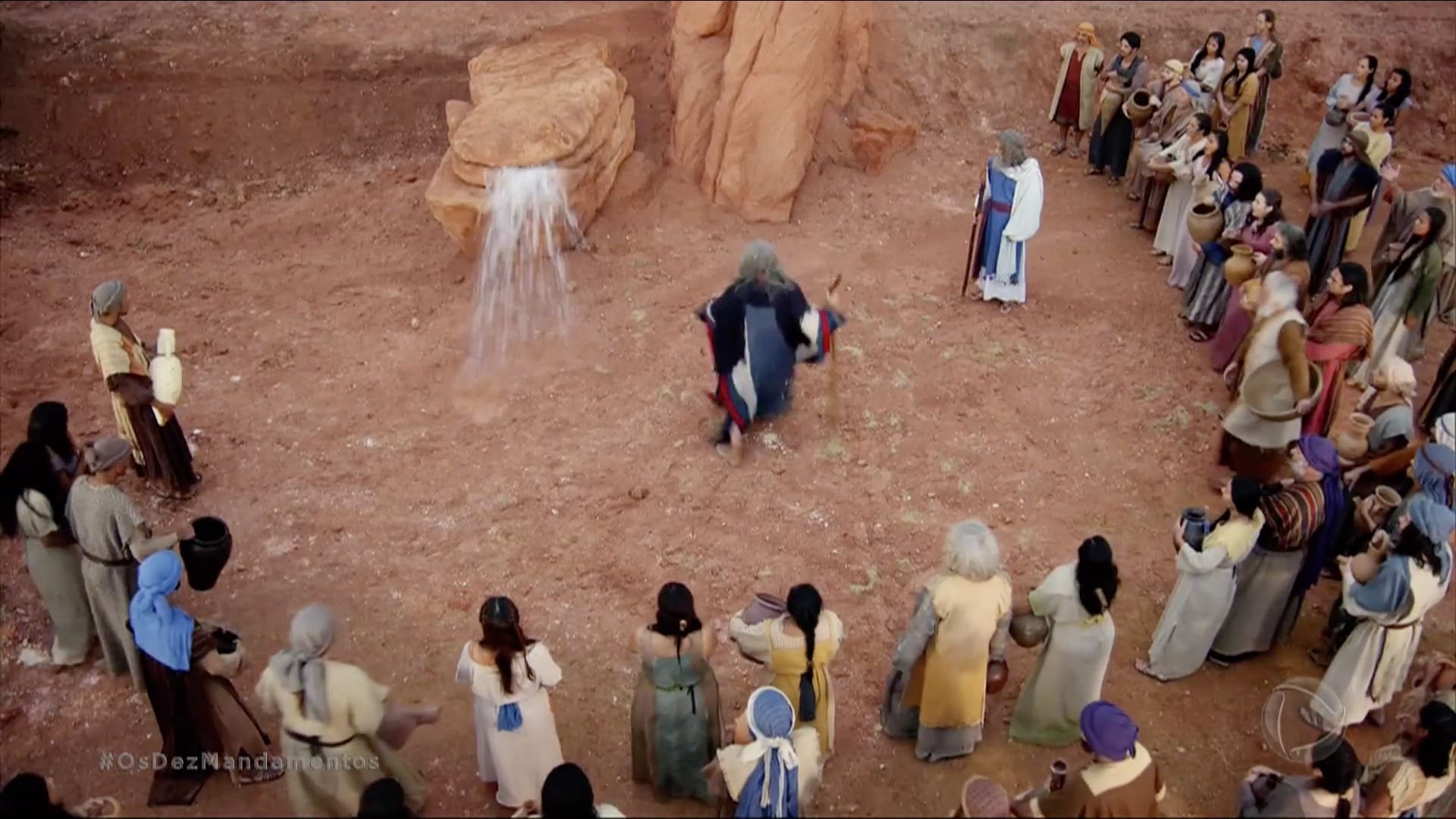 Moisés e Arão fazem sair água de uma rocha e Deus zanga-se